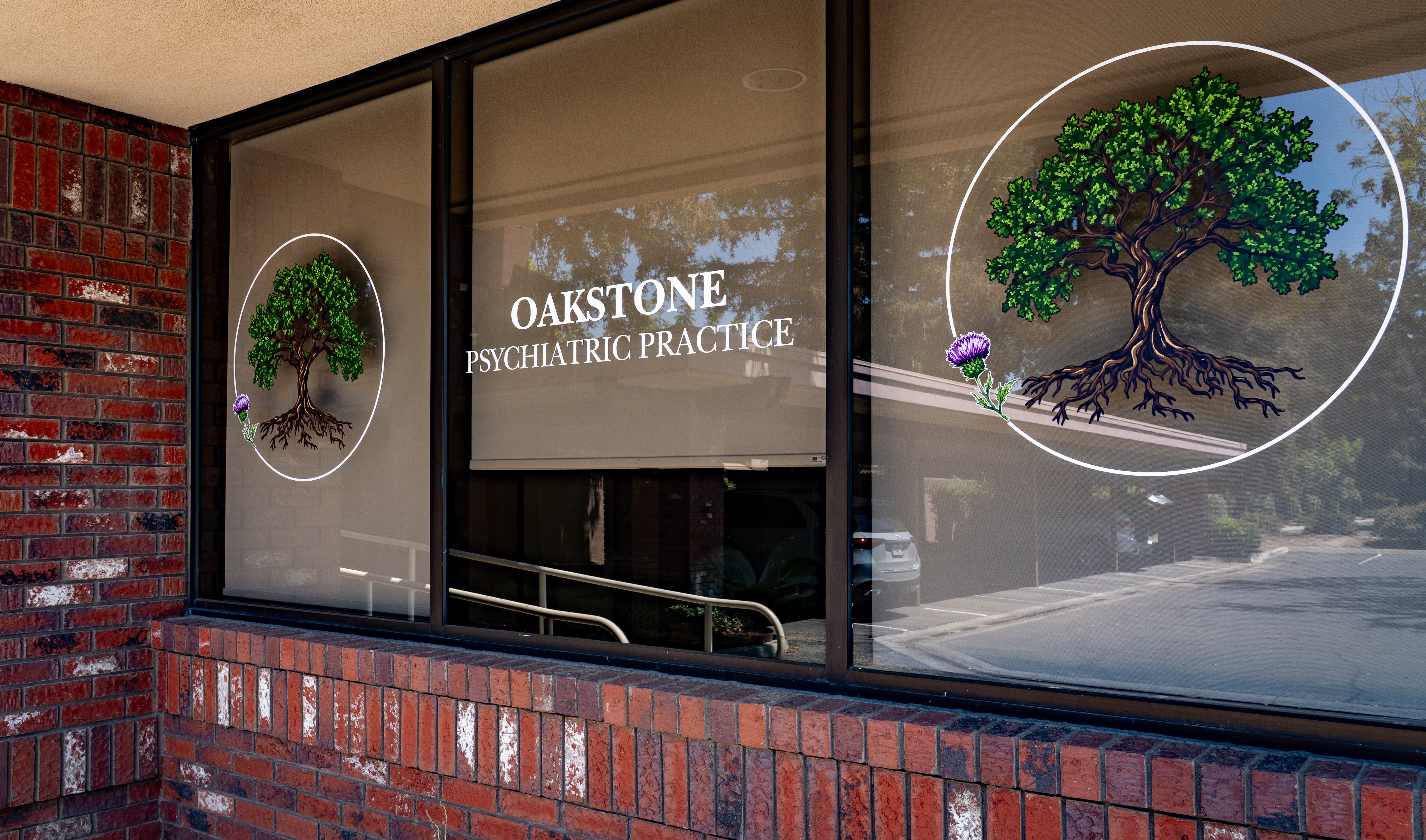 Oakstone Practice Front Window Graphic and Brick Facade